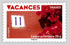Image du timbre Numéro sur un mur fleuri