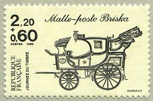 Image du timbre La malle-poste Briska brun foncé sur jaune clair